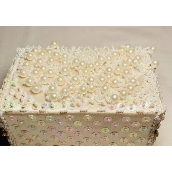 Elegant Cream Clutch with Pearl Embellishments and Wristlet - Picture 10 of 15